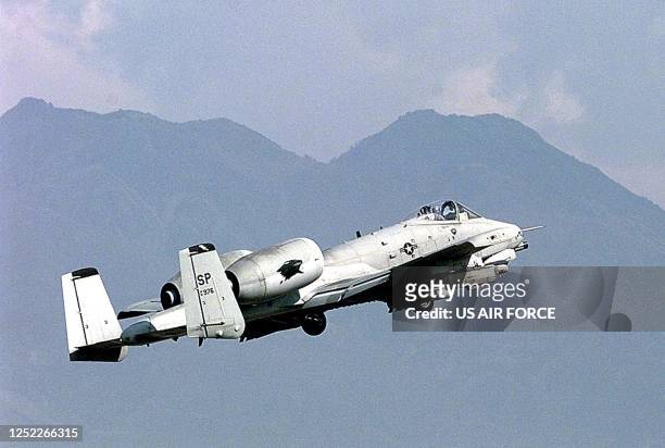 Thunderbolt II takes off on a mission against targets in Yugoslavia from Aviano air base 05 April 1999. Explosions rocked Belgrade 10 April 1999 as...