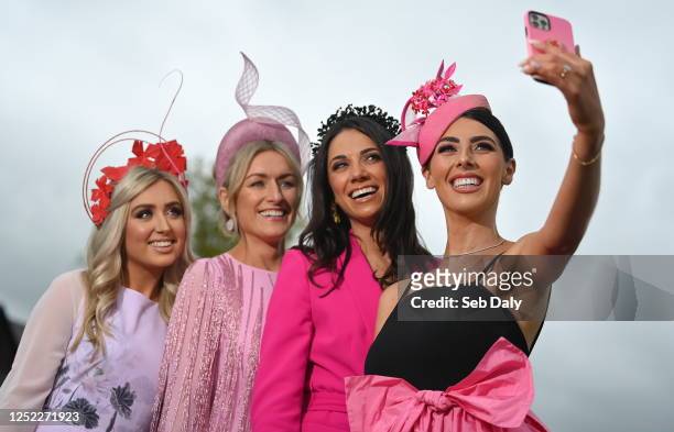 Kildare , Ireland - 28 April 2023; Racegoers, from right, Sarah McDermott, from Newbridge, Ruth McCabe, from Allen, AnnMarie Dunning, from Newbridge,...