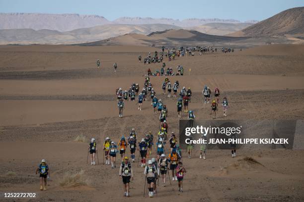 Competitors take part in stage 5 of the 37th edition of the Marathon des Sables between Jdaid and Kourci Dial Zaid in the Moroccan Sahara desert,...