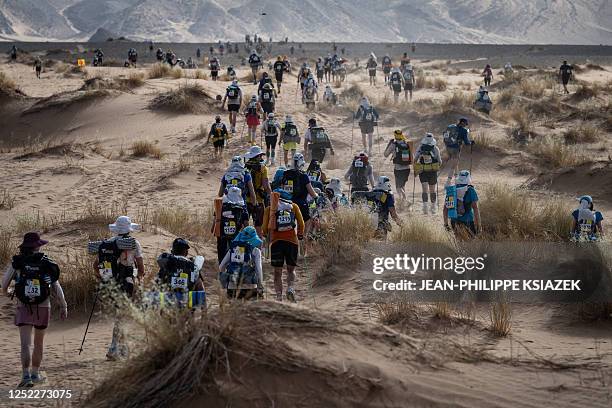 Competitors take part in stage 5 of the 37th edition of the Marathon des Sables between Jdaid and Kourci Dial Zaid in the Moroccan Sahara desert,...