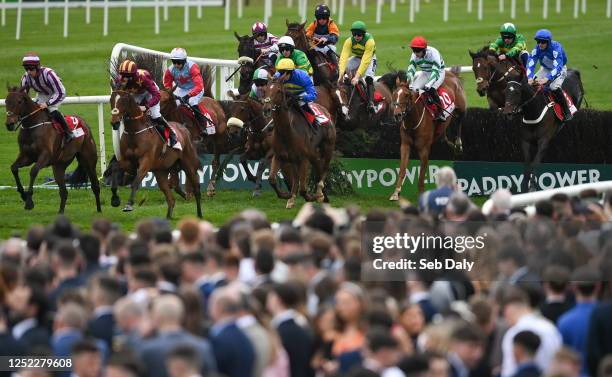 Kildare , Ireland - 28 April 2023; Runners and riders as they jump the fourth during the EMS Copiers Novice Handicap Steeplechase on day four of the...