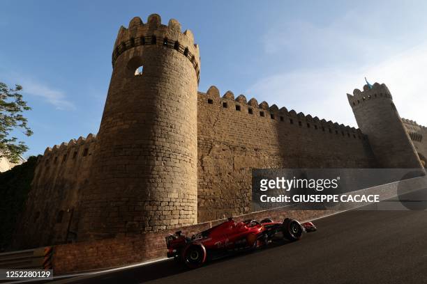 Ferrari's Monegasque driver Charles Leclerc steers his car during the qualifying session for the Formula One Azerbaijan Grand Prix at the Baku City...