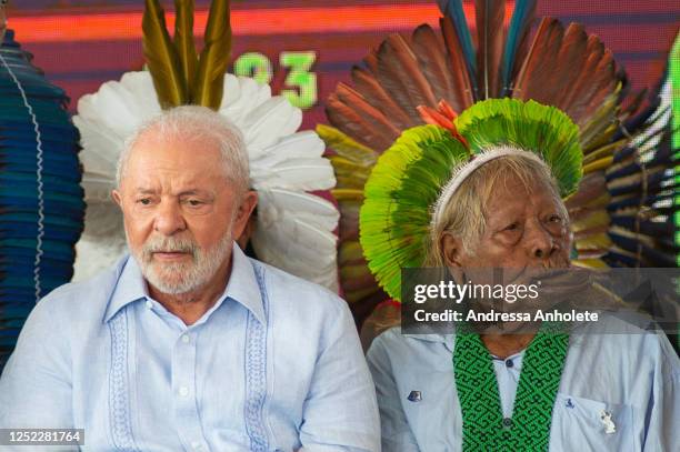 President of Brazil Luiz Inácio Lula da Silva and Chief of the Kayapo people Raoni Metuktire speak during the Terra Livre indigenous Camp closing...
