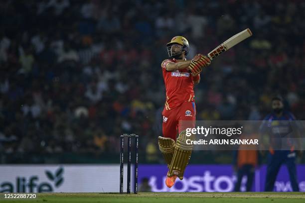 Punjab Kings' Sikandar Raza plays a shot during the Indian Premier League Twenty20 cricket match between Punjab Kings and Lucknow Super Giants at the...