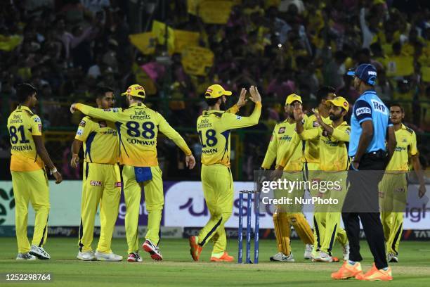 Chennai Super Kings players celebrate a wicket during the IPL T20 cricket match between Rajasthan Royals and Chennai Super Kings at Sawai Mansingh...