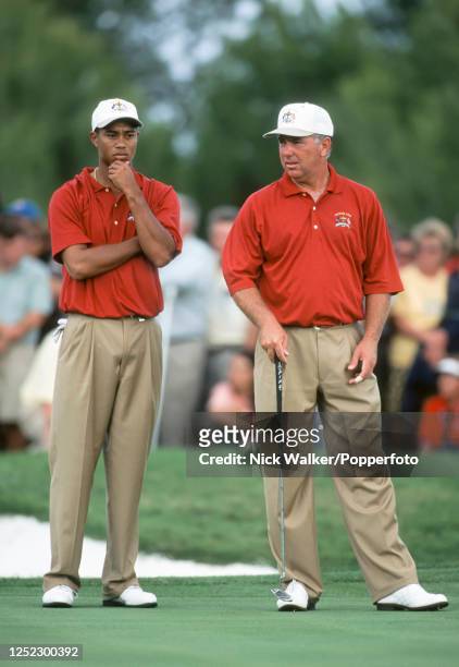 Tiger Woods and Mark O'Meara representing Team USA waiting to putt during the morning four-balls against Colin Montgomerie and Bernhard Langer...