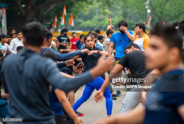 Indian women wrestler Vinesh Phogat warms up during the ongoing protest against Brij Bhushan Sharan Singh President Wrestling Federation of India and...