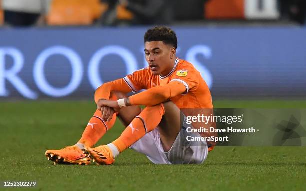 Blackpool's Morgan Rogers sits dejected at the final whistle during the Sky Bet Championship between Blackpool and Millwall at Bloomfield Road on...