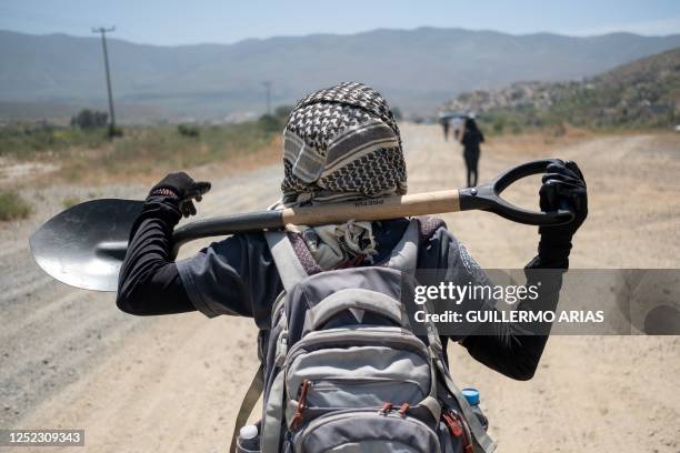 Tranquilina Hernandez, who has a disappeared daughter since 2014, takes part in a collective search in Valle de las Palmas, outskirts Tijuana, Baja...