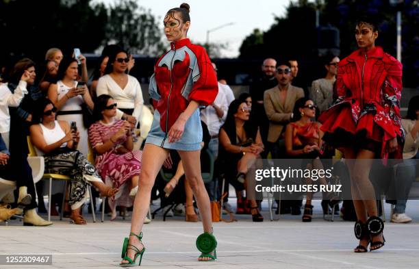 Model walks the runway showing a creation by design house "No Name" during the Fall-Winter collection show at Mercedes-Benz Fashion Week in...