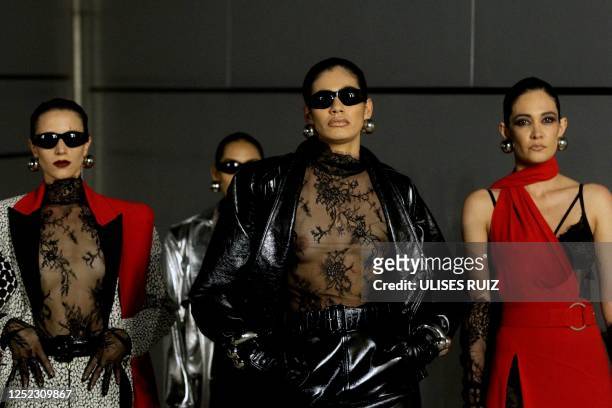 Models walk the runway showing creations by Mexican designer Alfredo Martinez during the Autumn-Winter collection show at Mercedes-Benz Fashion Week...