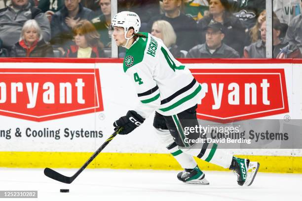 Miro Heiskanen of the Dallas Stars skates with the puck against the Minnesota Wild in the first period in Game Six of the First Round of the 2023...