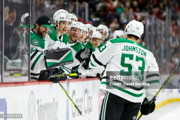 Wyatt Johnston of the Dallas Stars celebrates his goal against the Minnesota Wild with teammates in the second period in Game Six of the First Round...