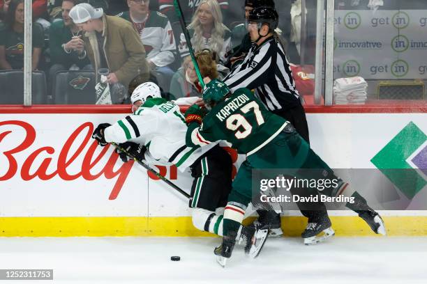 Kirill Kaprizov of the Minnesota Wild checks Ty Dellandrea of the Dallas Stars in the third period in Game Six of the First Round of the 2023 Stanley...