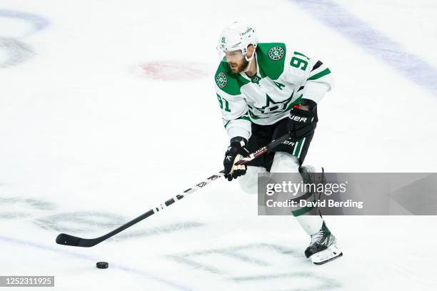 Tyler Seguin of the Dallas Stars skates with the puck against the Minnesota Wild in the third period in Game Six of the First Round of the 2023...