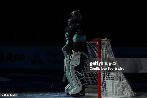 Seattle Kraken goaltender Philipp Grubauer stands before the start of the National Anthem during game 6 of a NHL Western Conference 1st round matchup...