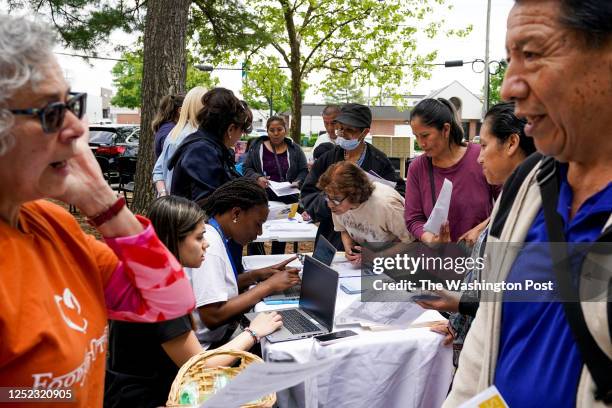 In an event hosted by Second Story, families gather for resources, including Medicaid eligibility and enrollment information offered by Neighborhood...