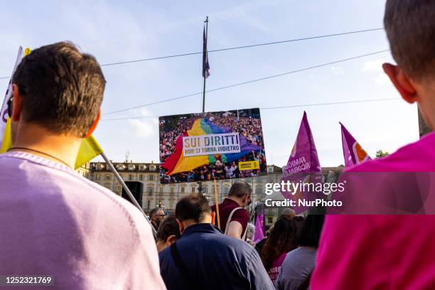 The rainbow families, an association of families with homosexual parents demonstrate in the square Piazza Castello, Torino Italy, on april 28 wearing...