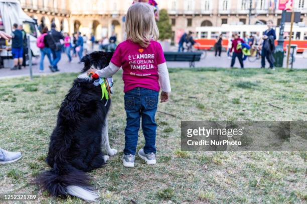 The rainbow families, an association of families with homosexual parents demonstrate in the square Piazza Castello, Torino Italy, on april 28 wearing...