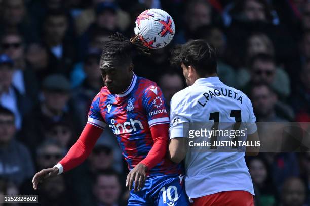 Crystal Palace's English midfielder Eberechi Eze vies with West Ham United's Brazilian midfielder Lucas Paqueta during the English Premier League...