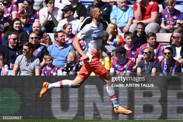 West Ham United's Czech midfielder Tomas Soucek celebrates after scoring the opening goal of the English Premier League football match between...