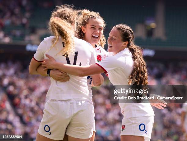 England's Abby Dow celebrates scoring her sides first try with England's Ellie Kildunne and England's Lucy Packer during the TikTok Women's Six...