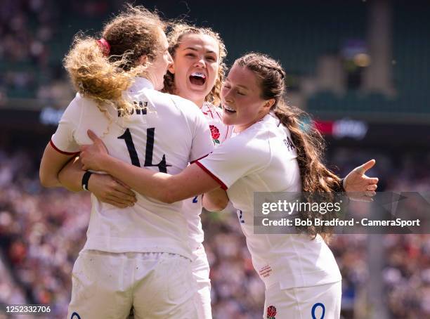 England's Abby Dow celebrates scoring her sides first try with England's Ellie Kildunne and England's Lucy Packer during the TikTok Women's Six...