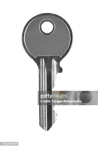 metal key isolated on white background - house keys stock pictures, royalty-free photos & images