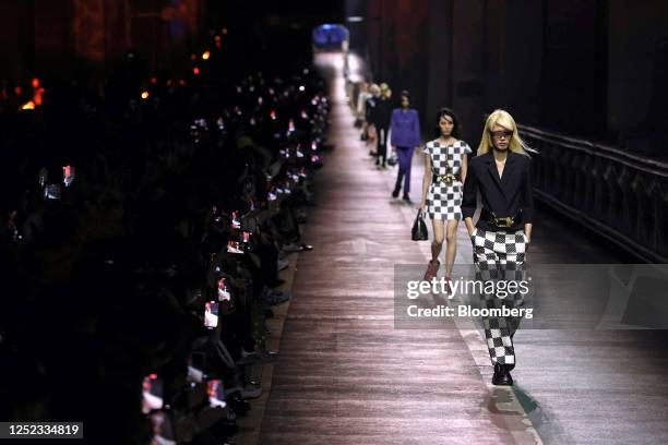 Models walk on the runway during the Louis Vuitton Pre-Fall 2023 Women's Collection show on the Jamsu bridge in Seoul, South Korea, on Saturday,...