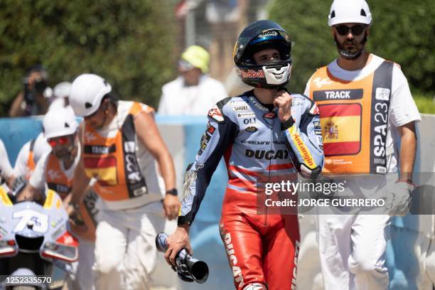 Ducati Spanish rider Alex Marquez leaves the track after a crash during the sprint race of the MotoGP Spanish Grand Prix at the Jerez racetrack in...