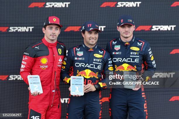 Winner Red Bull Racing's Mexican driver Sergio Perez , second placed Ferrari's Monegasque driver Charles Leclerc and third placed Red Bull Racing's...