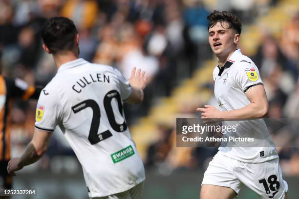 Luke Cundle of Swansea City celebrates his goal with Liam Cullen during the Sky Bet Championship match between Hull City and Swansea City at the MKM...