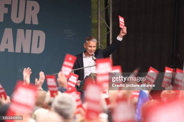 April 2023, Thuringia, Erfurt: Björn Höcke, chairman of the AfD in Thuringia, speaks at the event "Future for Germany" on Theaterplatz and holds a...