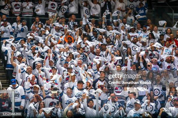 Fans wave white towels as they show their support for the Winnipeg Jets prior to NHL action against the Vegas Golden Knights in Game Three of the...