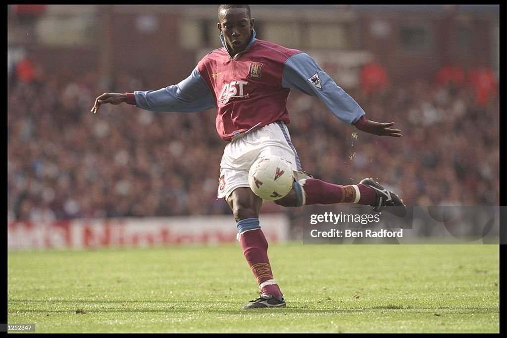 Dwight Yorke of Aston Villa in action