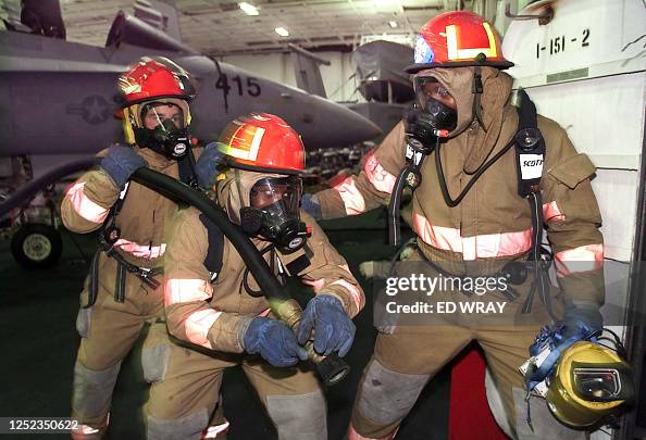Damage Control Party Navy damage control team trains during a general quarters drill... News ...