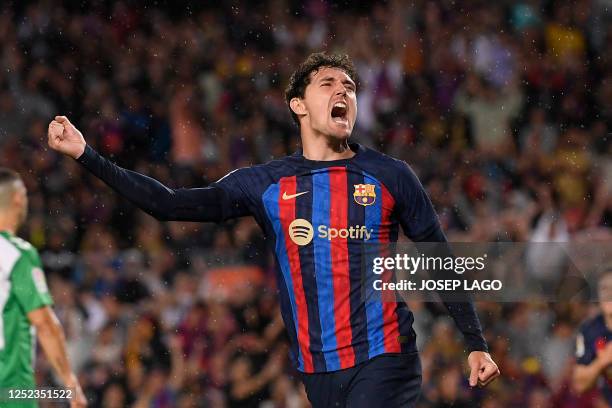 Barcelona's Danish defender Andreas Christensen celebrates scoring his team's first goal during the Spanish league football match between FC...