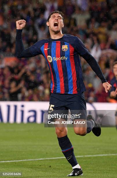 Barcelona's Danish defender Andreas Christensen celebrates scoring his team's first goal during the Spanish league football match between FC...