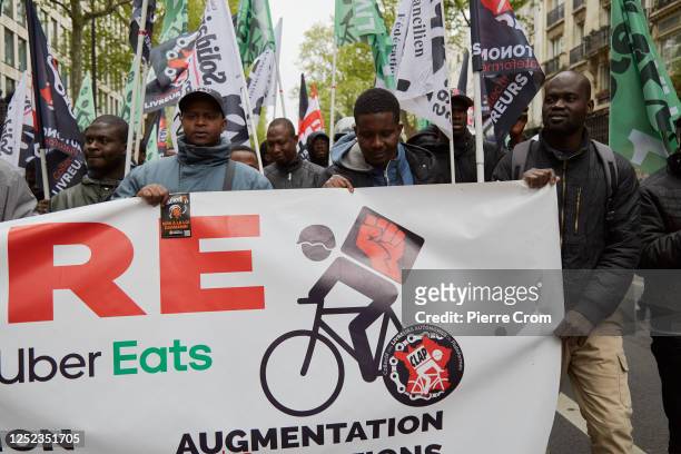 Undocumented workers and human rights activists march to protest against the immigration bill on April 29, 2023 in Paris, France. Interior minister...