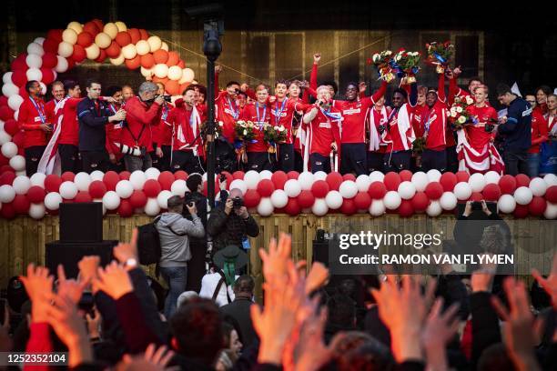 Players of AZ Youth Under 19 celebrate during a ceremony at the Waagplein in Alkmaar on April 29 after winning the UEFA Youth League. / Netherlands...