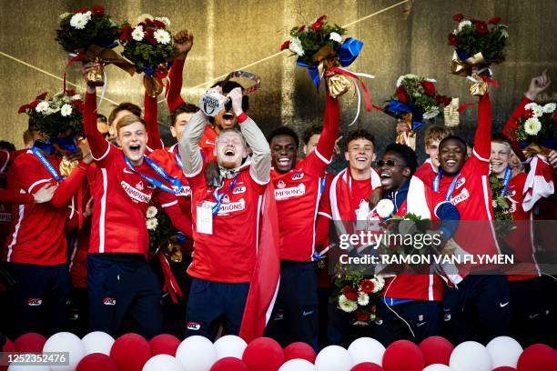 Players of AZ Youth Under 19 celebrate during a ceremony at the Waagplein in Alkmaar on April 29 after winning the UEFA Youth League. / Netherlands...