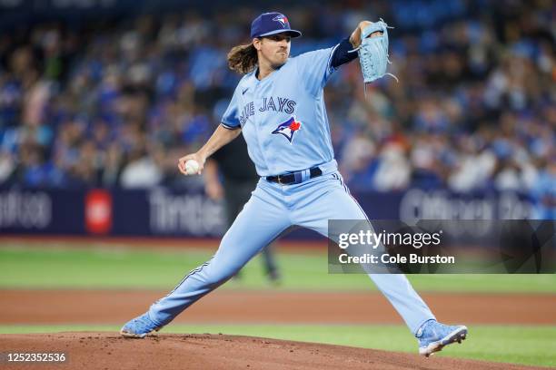 Kevin Gausman of the Toronto Blue Jays pitches against the Seattle Mariners in the first inning of their MLB game at Rogers Centre on April 29, 2023...