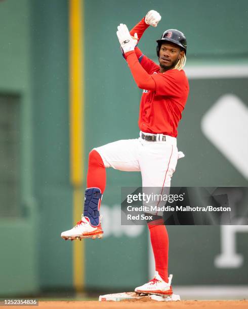 Raimel Tapia of the Boston Red Sox reacts after hitting an RBI double during the fourth inning of a game against the Cleveland Guardians on April 29,...