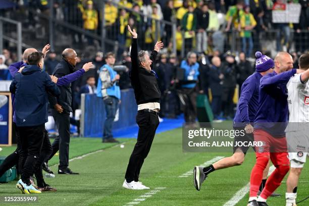 Toulouse's French head coach Philippe Montanier celerates after winning the French Cup final football match between Nantes and Toulouse at the Stade...