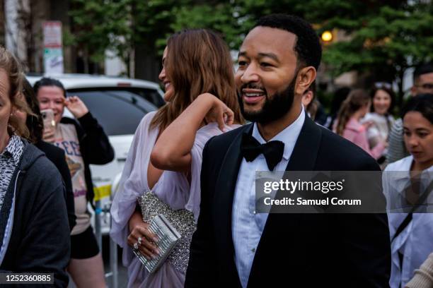 John Legend and his wife Chrissy Teigan arrive for the White House Correspondents' Dinner at the Washington Hilton on April 29, 2023 in Washington,...