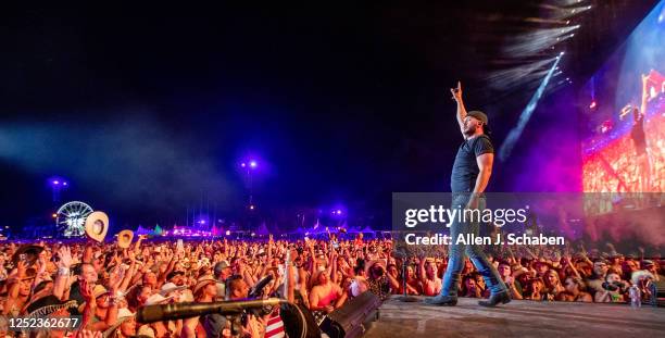 Large crowd cheers as first day headliner Luke Bryan performs on the Mane Stage at the three-day Stagecoach Country Music Festival at the Empire Polo...