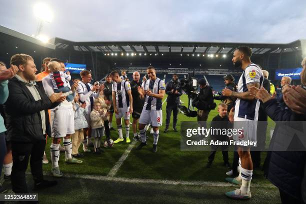 West Bromwich Albion players and staff form a guard of honour to applaud and appreciate retiring club captain Jake Livermore of West Bromwich Albion...