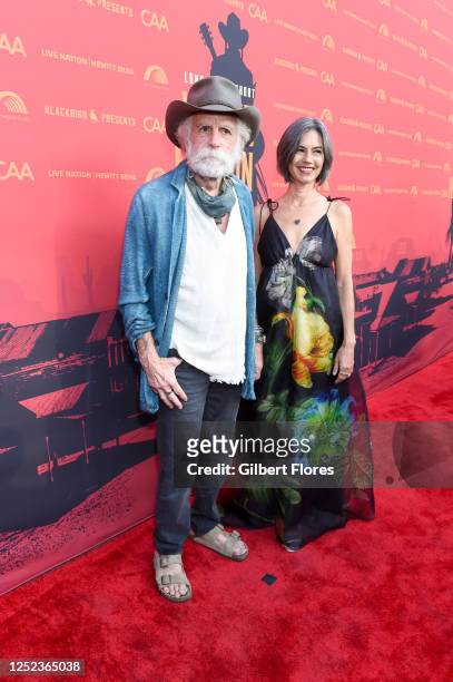 Bob Weir and Natascha Münter at "Long Story Short: Willie Nelson 90" held at the Hollywood Bowl on April 29, 2023 in Los Angeles, California.