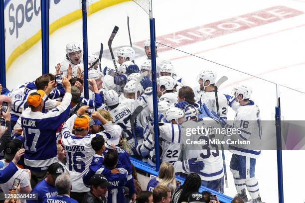 The Toronto Maple Leafs celebrate the series win against the Tampa Bay Lightning in Game Six of the First Round of the 2023 Stanley Cup Playoffs at...