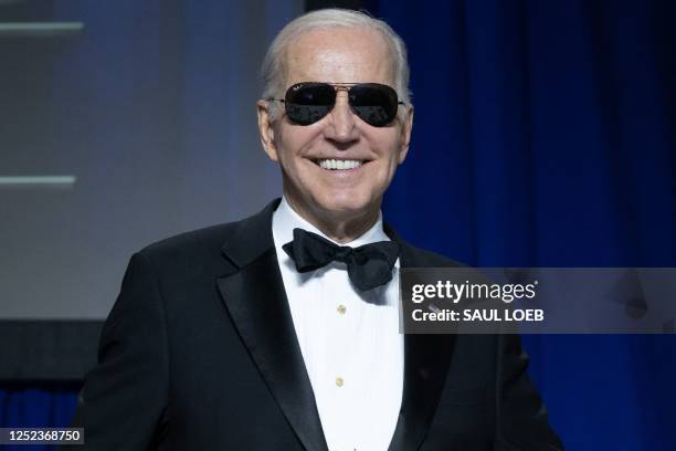 President Joe Biden smiles during the White House Correspondents' Association dinner at the Washington Hilton in Washington, DC, April 29, 2023.